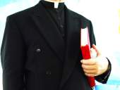 priest with book